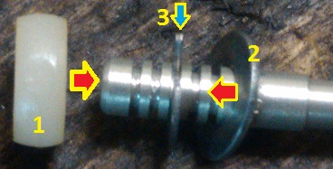 Окончательное положение стопора, проставки и шайбы на игле.jpg